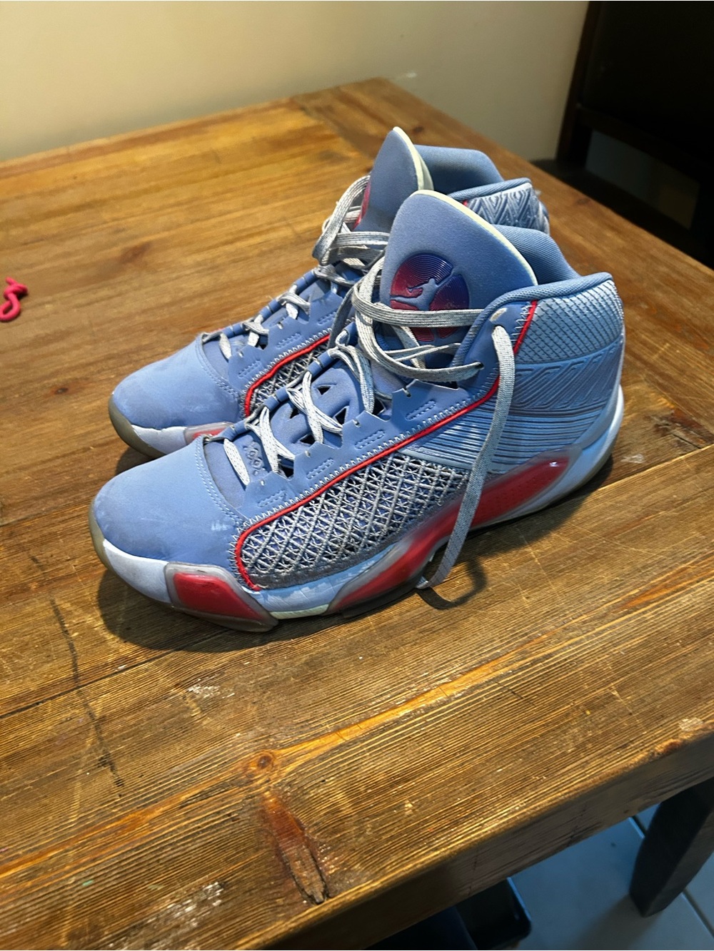Nike Blue High-Top Basketball Shoes with Red Accents